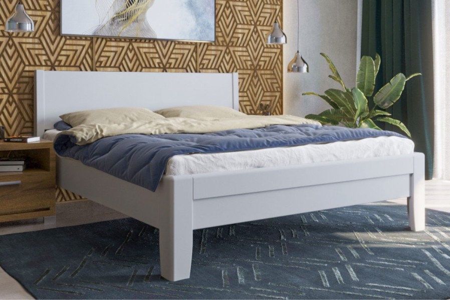 Robustní masivní postel Sion K1 bude důstojnou dominantou vaší ložnice, do které přinese útulnost i komfort.