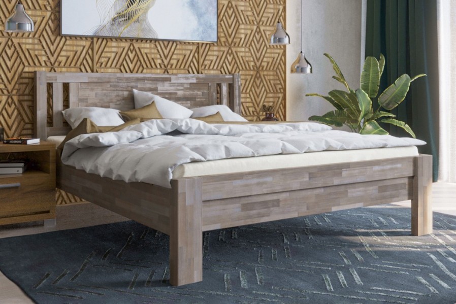 Robustní masivní postel Sion H2 bude důstojnou dominantou vaší ložnice, do které přinese útulnost i komfort.