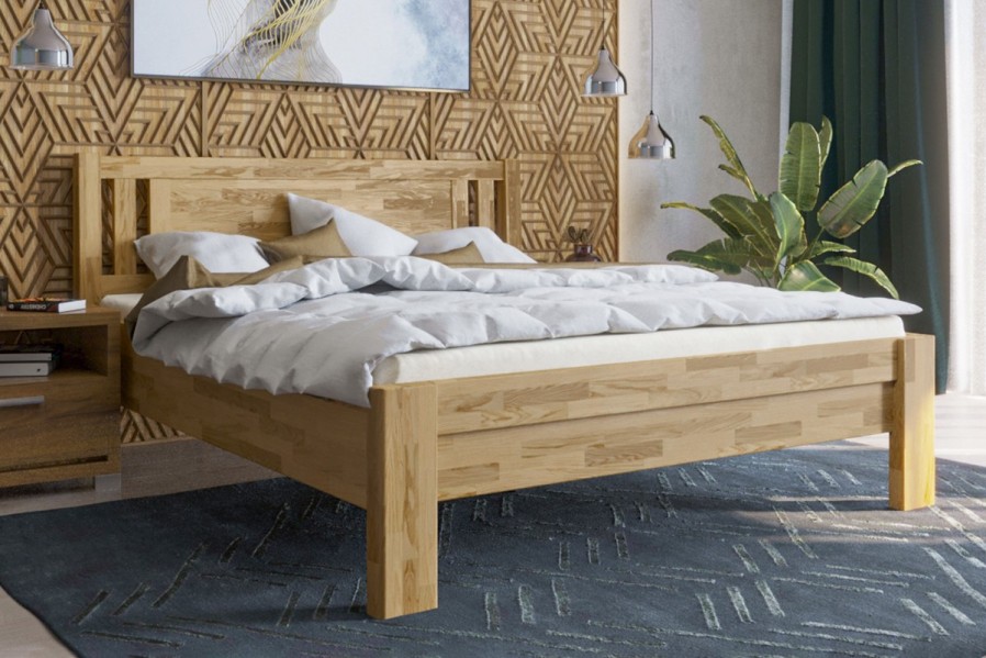 Robustní masivní postel Sion H2 bude důstojnou dominantou vaší ložnice, do které přinese útulnost i komfort.