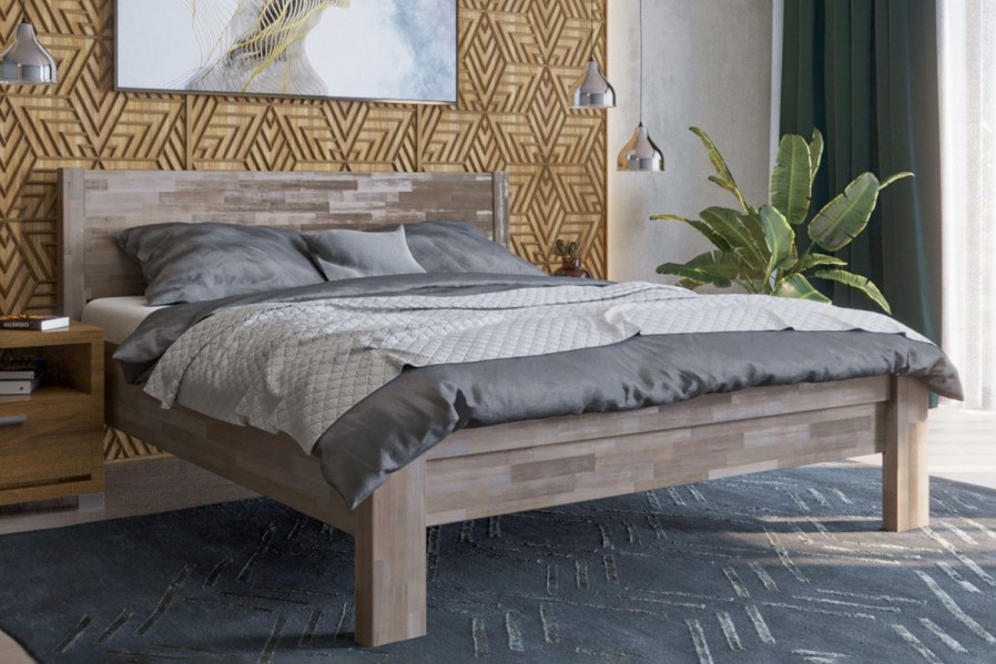 Robustní masivní postel Sion H1 bude důstojnou dominantou vaší ložnice, do které přinese útulnost i komfort.