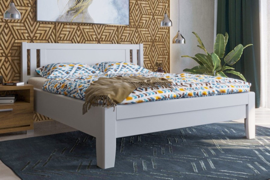 Robustní masivní postel Sion K2 bude důstojnou dominantou vaší ložnice, do které přinese útulnost i komfort.