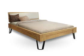 Celomasivní postel v moderním designu s čalouněným čelem